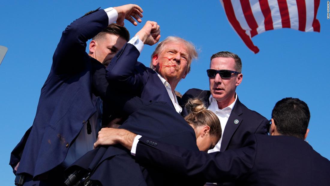 Trump, with blood on his face, raises his fist to the crowd as he is surrounded by Secret Service agents at a campaign rally in Butler, Pennsylvania, in July 2024. &lt;a href=&quot;https://www.cnn.com/2024/07/13/politics/trump-injured-pennsylvania-rally/index.html&quot; target=&quot;_blank&quot;&gt;Trump was injured&lt;/a&gt; in a shooting that the FBI said was an assassination attempt.